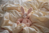 Fototapeta Kosmos - Generative AI Image of Cute Rabbit Doll Toy on the Bed with Blanket