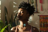 Fototapeta Konie - Black woman breathing and doing meditation at home
