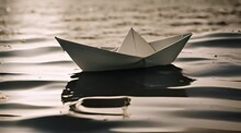 Paper Boat On The Sea