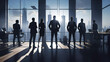 Silhouettes of business people in a meeting