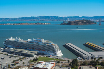 Modern mega cruiseship cruise ship liner Royal or Regal docked at terminal in port San Francisco, California ready for Mexican Riviera or Hawaii summer cruising