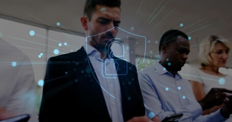 Poster - Animation of shield with padlock over diverse colleagues using smartphones