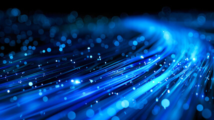 Poster - Abstract blue data flow light streak over a black background. Communication technology and data traffic concept.