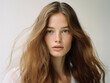 © Aleksandr - International Women's Day. Long healthy hair. Skin natural beauty,  smooth skin for Care and hair products. Model girl, smiling woman.