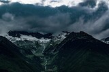 Fototapeta Panele - clouds over the mountains