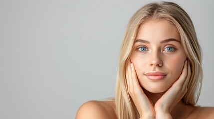 Wall Mural - Beautiful blonde woman with healthy skin, natural makeup, studio background, copy space.