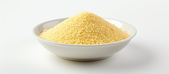 Poster - Vibrant Yellow Powder in a Ceramic Bowl for Spices and Seasonings