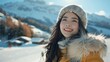 © tonstock - Joyful asian woman strolls through snowy ski resort, enjoying chilly winter day on snow-covered mountain.