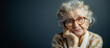 © RISHAD - Elderly lady with glasses in deep thought.
