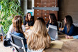 © ADDICTIVE STOCK - Women's meeting in modern office setting