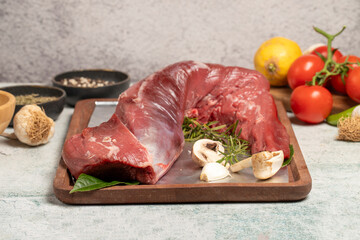 Poster - Beef Tenderloin. Butcher products. Raw beef tenderloin on stone background