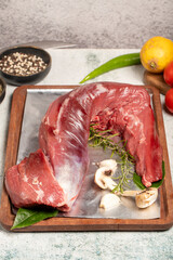 Poster - Beef Tenderloin. Butcher products. Raw beef tenderloin on stone background