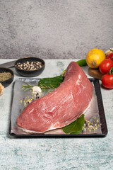 Poster - Raw eye round meat. Butcher products. Raw beef round over on stone ground