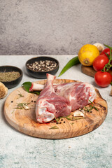 Wall Mural - Lamb's shank. Butcher products. Lamb shank steak with bones on stone background