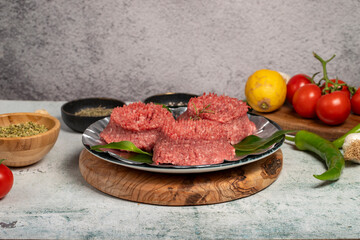 Wall Mural - Ground beef. Butcher products. Raw ground beef on stone background