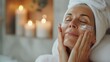 Self-Care Splendor: Middle-Aged Woman Indulging in Anti-Aging Facial Massage