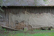 Fishing nets hang to dry near a boathouse on the lake