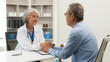 © MrAshi - Senior Asian female doctor at hospital or clinic shaking hands with patient, healthcare and professional concept, Asian handshake, experienced female doctor giving advice to elderly male patient