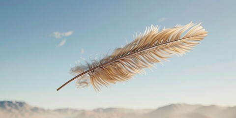 A feather is floating in the air above a mountain range