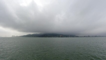 Poster - Taipei, Taiwan, Republic of China, 01 22 2024: Clean Tamsui river in a raining day in winter	
