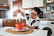 © Santi Nuñez/Stocksy - Man having breakfast