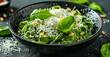 Italian gourmet dish with spinach pasta, cheese and pine nuts