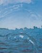 © Pietari Purovaara/Stocksy - a scenery shot through a glassy impact of water