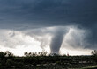 © Wirestock - Huge dark cloud with a swirling funnel in southwest Texas