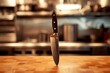 Knife on Wooden Table in Kitchen