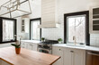 © Minette Hand/Stocksy - Kitchen Interiors of a Builder Grade Home