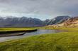 © Heng Yu/Stocksy - Rustic Mountain Valley with Grazing Cattle and Flowing River