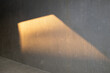 © Colour Laboratory/Stocksy - Golden hour reflection on a grey brutal concrete wall