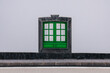 © Nibuya Qubik/Stocksy - green wooden window