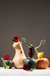 © Irina Bo/Stocksy - still life of vegetables on a gradient background