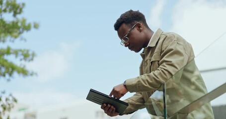 Fototapete - Black man, city and balcony with tablet for research, communication or outdoor networking. Young African businessman or employee on technology or terrace in social media, browsing or creative startup