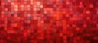 A red wall covered in small square tiles arranged in a mosaic pattern, creating a visually striking and textured surface.