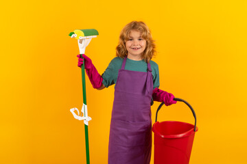 Wall Mural - Child use duster and gloves for cleaning. Funny child mopping house. Cleaning accessory, cleaning supplies. Housekeeping and home cleaning.