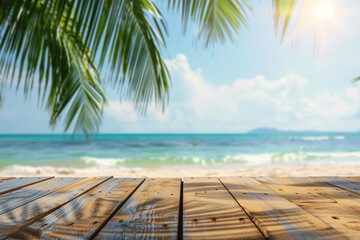 Wall Mural - Top of wooden table with sea view and palm leaves Calm sea and sky at tropical beach background show off your products. summer vacation background concept