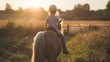 Child rides her pony in the morning sunshine