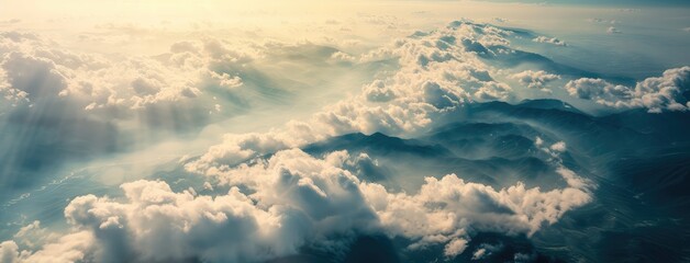 Wall Mural - Majestic Sunrise Above Cloud-Covered Mountain Peaks