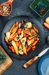 Canvas Print - Roasted parsnip root and carrots.