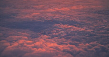 Wall Mural - fly above color sky clouds during dramaric sunset or sunrise cloudscape, nature panorama landscape