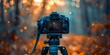 © Anastasiia - A digital cinema camera on a tripod against a blurred background. Concept Cinematography, Camera Equipment, Film Production, Technology, Filmmaking
