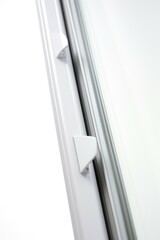 Poster - Detailed shot of a door handle on a glass door, suitable for architectural or interior design concepts