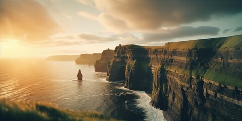Leinwandbilder - A picturesque view of the ocean and cliffs at sunset. Suitable for travel and nature themed projects