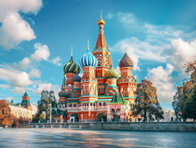 Iconic St. Basil's Cathedral In Moscow, Featuring Vibrant Colors And Intricate Architecture Under Blue Skies.