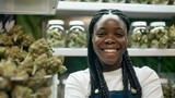 Fototapeta Konie - Young African American woman, employee of cannabis shop