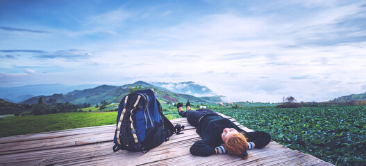 Asian women travel sleep relax. Morning atmosphere nature Forests, mountains. Phu Thap Buek Thailand