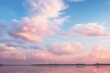 Soft clouds in shades of pale pink, misty blue, and delicate peach, creating an ethereal and contemplative scene.