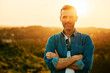 © baranq - Portrait of adult man during summer sunset in countryside